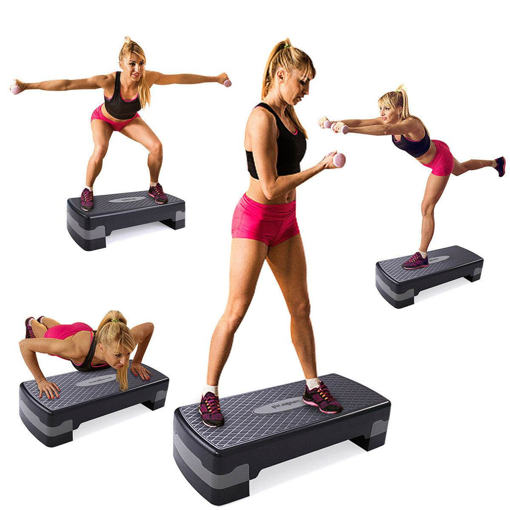 Exercise at home using a step up workout to do aerobic exercise with dumbells and zumba